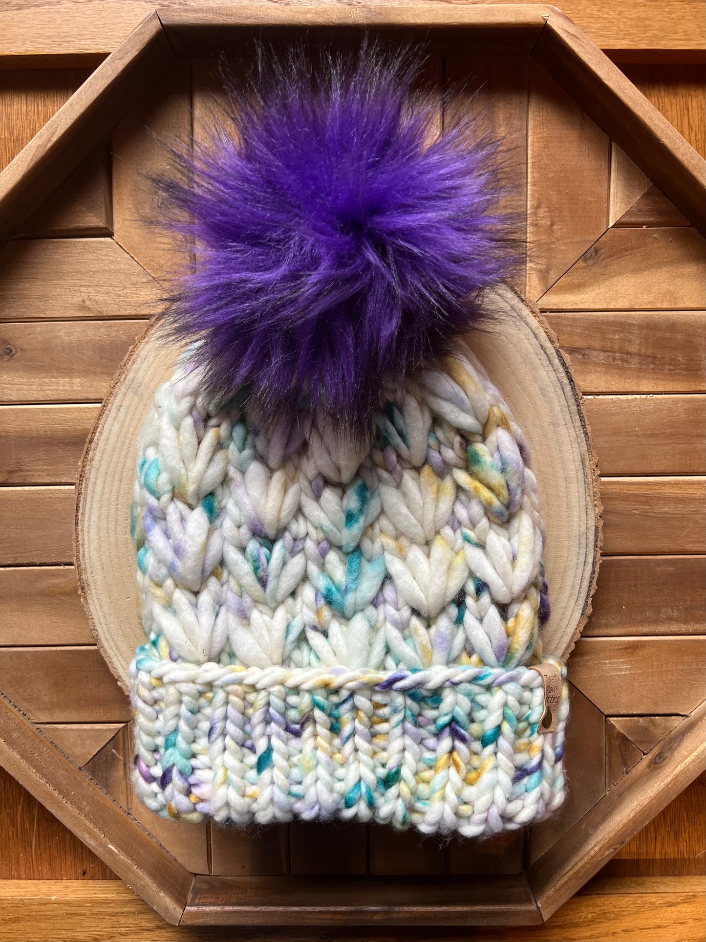Merino wool hat w/ removable faux fur pom