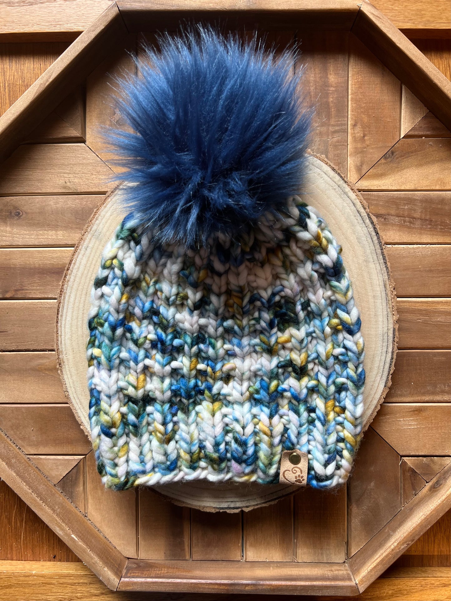 Merino wool hat w/ removable faux fur pom